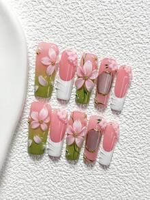 10件套春日樱花风手工美甲套装，包含假指甲贴纸、小花朵美甲装饰、手工粉色五瓣花美甲贴、绿白指甲油、3D立体浮雕梦幻美甲配件，内含指甲锉（1张果冻贴纸+1把指甲锉），三种尺寸可选：杏仁形、鸭嘴形、棺材形，适合春夏派对、日常佩戴、拍照、通勤等场合。 - 彩色 - 查看 20