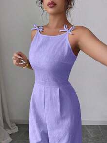 El mono de pierna ancha Elezga Elegante, con decoración de lazo en los hombros y estampado floral de margaritas en tela de brocado, es adecuado para el uso diario. - Morado - Ver 3