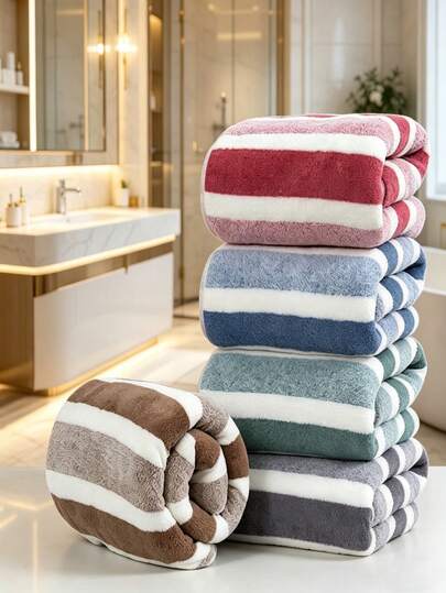 这款条纹珊瑚绒浴巾尺寸为27.56英寸*55.12英寸，颜色为粉色/蓝色/灰色/绿色/米色。超级柔软吸水，适合家庭使用。尺寸为27.56英寸*55.12英寸。不掉毛。这款条纹沙滩巾亲肤柔软，非常舒适。