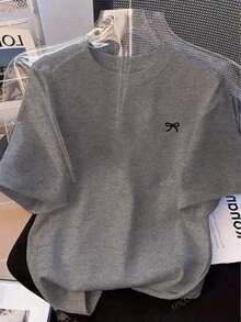 Camiseta de manga corta holgada con estampado de lazo y hombros anchos, casual, negra, de verano - Gris Claro - Ver 11