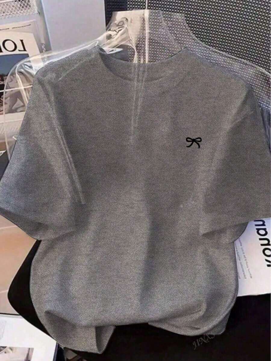 Camiseta holgada de manga corta con estampado de lazo y hombros anchos, de estilo casual para el verano - Gris Claro - Ver 1