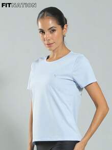 FITNATION Fitness T-Shirt With DRYFIT Technology For Quick Sweat Drying, Ideal For All Sports. - Blue Sky - View 1