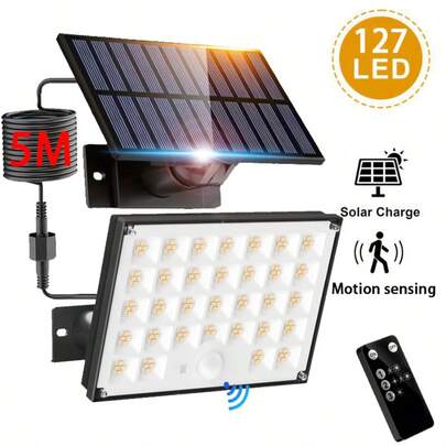 127 Luces LED cálidas con sensor de movimiento solar, luz de inundación para exteriores IP65 con control remoto y cable de 5M, 3 modos de iluminación, adecuado para patio, jardín, porche, calle comercial, regalo del Día del Padre