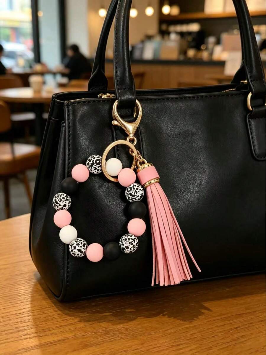 Vòng tay in họa tiết hạt gỗ, móc khóa túi xách, phụ kiện mặt dây chuyền tua rua hạt gỗ in họa tiết da báo đen trắng sáng tạo, vòng tay chống thất lạc cho nữ, thích hợp làm quà tặng cho bạn bè và gia đình. Quà tặng ngày lễ, quà tặng tốt nghiệp, quà tặng Ngày của Mẹ. Một phụ kiện móc khóa nữ quyến rũ, đồ trang trí móc khóa xe hơi, mặt dây chuyền móc khóa túi xách. Có thể được dùng làm phần thưởng huy chương cho nhân viên nữ xuất sắc. Quà tặng Ngày của Cha cho nam giới, quà tặng cho bố. Móc khóa ba lô bán sỉ có thẻ nhận dạng. - da báo - Xem 1