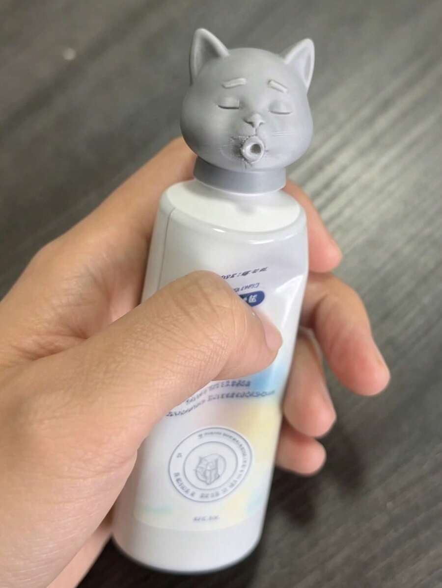 猫咪造型牙膏挤压器，为浴室增添趣味创意。宠物爱好者的理想之选，让每日刷牙更加可爱有趣。