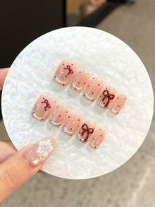 Nâng tầm phong cách của bạn với bộ móng giả thủ công ngắn, vuông, kiểu Pháp hình trái tim, tối giản, màu hồng thạch, phù hợp cho các bữa tiệc, đám cưới hoặc sử dụng hàng ngày. Bộ sản phẩm gồm 2 miếng gel thạch và 1 dụng cụ mài móng. - Đỏ - Xem 6