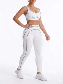 Bộ đồ thể thao nữ gồm áo tank top ngắn và quần legging phối màu tương phản, thích hợp cho tập luyện và thể dục. - trắng - Xem 2