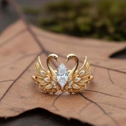 Anillo de compromiso chapado en oro de 18K con diseño de alas de cisne y circonita cúbica para mujer