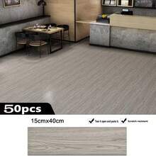 50 片木纹 PVC 地板砖，尺寸为 15.71 英寸 * 6 英寸，可拆卸加厚磨砂木纹材质，自粘墙贴，适用于装饰地板、浴室、厨房、学校和办公室的墙壁和地板，具有防水、防油和耐磨特性，是家居装饰的理想之选。 - 地貼50pcs - 查看 10