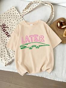 2 Stücke Tween-Mädchen, dies ist ein neuer Frühlings-/Sommer-Stil mit einem lässigen Buchstaben-Muster mit einem Krokodil-Thema, ein Rundhals-Sweatshirt mit kurzen Ärmeln und ein Pullover für Mädchen, sowie ein grün kariertes Shorts-Muster T-Shirt für Kinder. - Aprikosenfarben - Übersicht 3