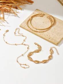 4 piezas Conjunto de tobilleras doradas con capas estilo bohemio para mujeres, cadena de pie con cuentas de concha cowrie, joyería de verano para playa y vacaciones - Dorado - Ver 2