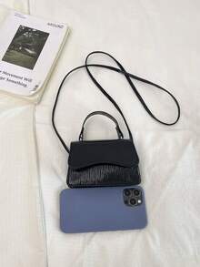 一款简约、高品质、质感出众的多功能日常通勤包。2026新款女士斜挎包，质感极佳。 - 黑色 - 查看 10