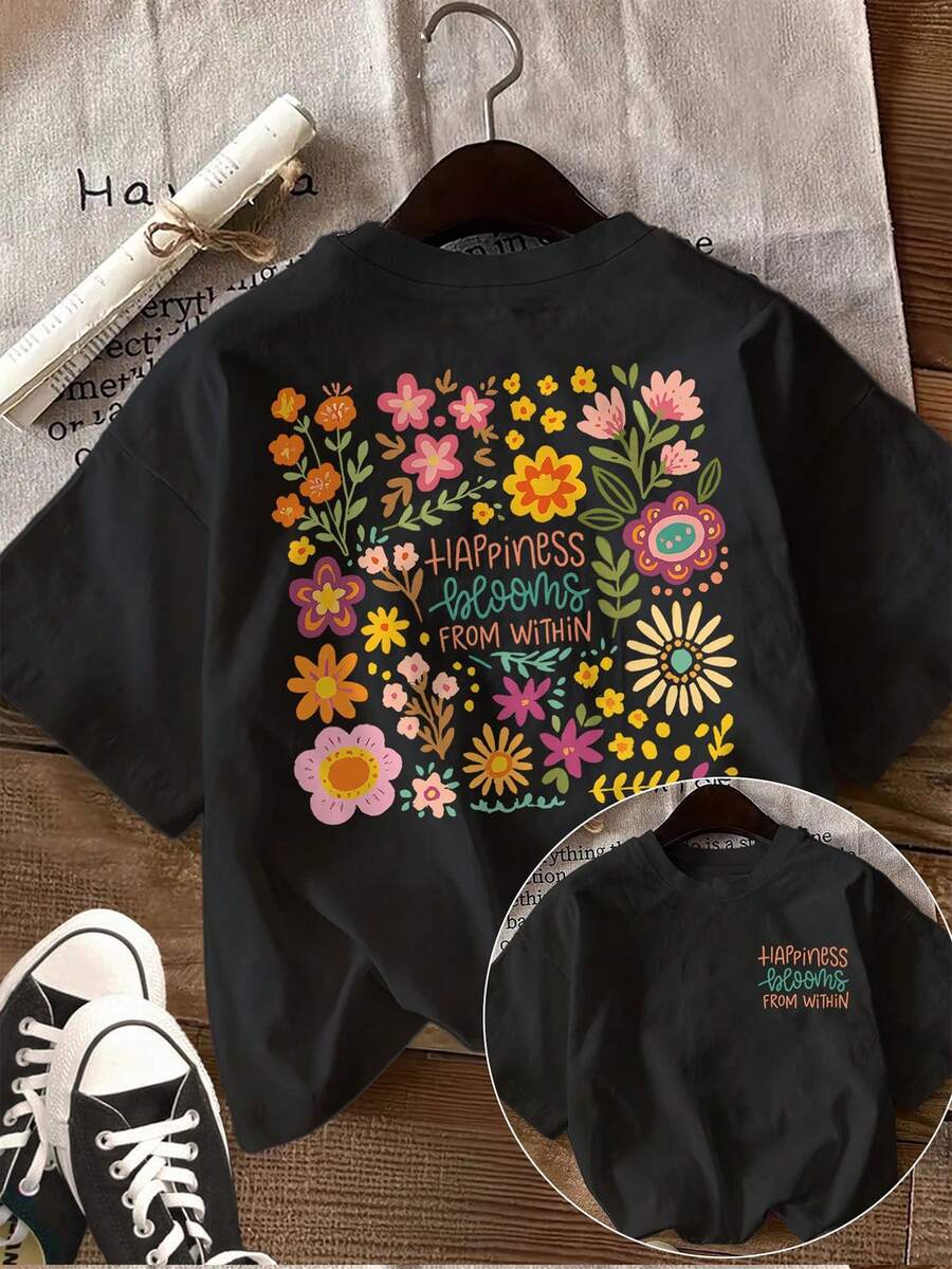 This Stylish, Casual Women's Top Features A Double-Sided Print, Perfect For Spring And Summer, With A Round Neck And Short Sleeves, Showing A Fresh Floral Pattern Along With The Text 'HAPPINESS Blooms FROM' - Women's T-Shirt. - Black - View 1