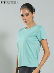 FITNATION Fitness T-Shirt With DRYFIT Technology For Quick Sweat Drying, Ideal For All Sports. - Light Green - View 1