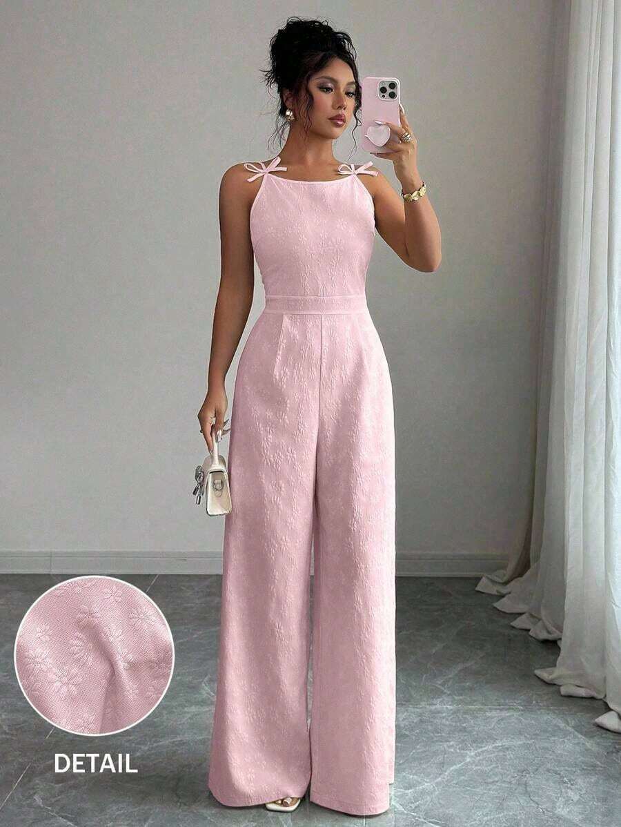 El mono de pierna ancha Elezga Elegante, con decoración de lazo en los hombros y estampado floral de margaritas en tela de brocado, es adecuado para el uso diario. - Rosa - Ver 1