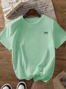 Envío gratis, entrega local enéxico, entrega en 4 días.Camiseta de manga corta con estampado de lazo, corte holgado, para primavera/verano, ropa casual. - verde menta - Ver 4