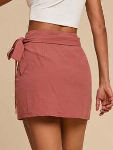 Elegante falda envolvente de mujer en color caqui, con diseño de lazo ajustable.Estilo minimalista y versátil, ideal para oficina y uso casual en verano, prenda chic y cómoda para cualquier ocasión. - Óxido marrón - Ver 2