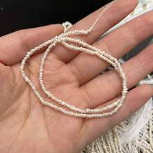 1 Chuỗi hạt ngọc trai nước ngọt tự nhiên không đối xứng, thích hợp để làm đồ trang sức, vòng cổ và vòng tay thủ công, đồ dùng may vá, chiều dài 36cm. - trắng - Xem 3
