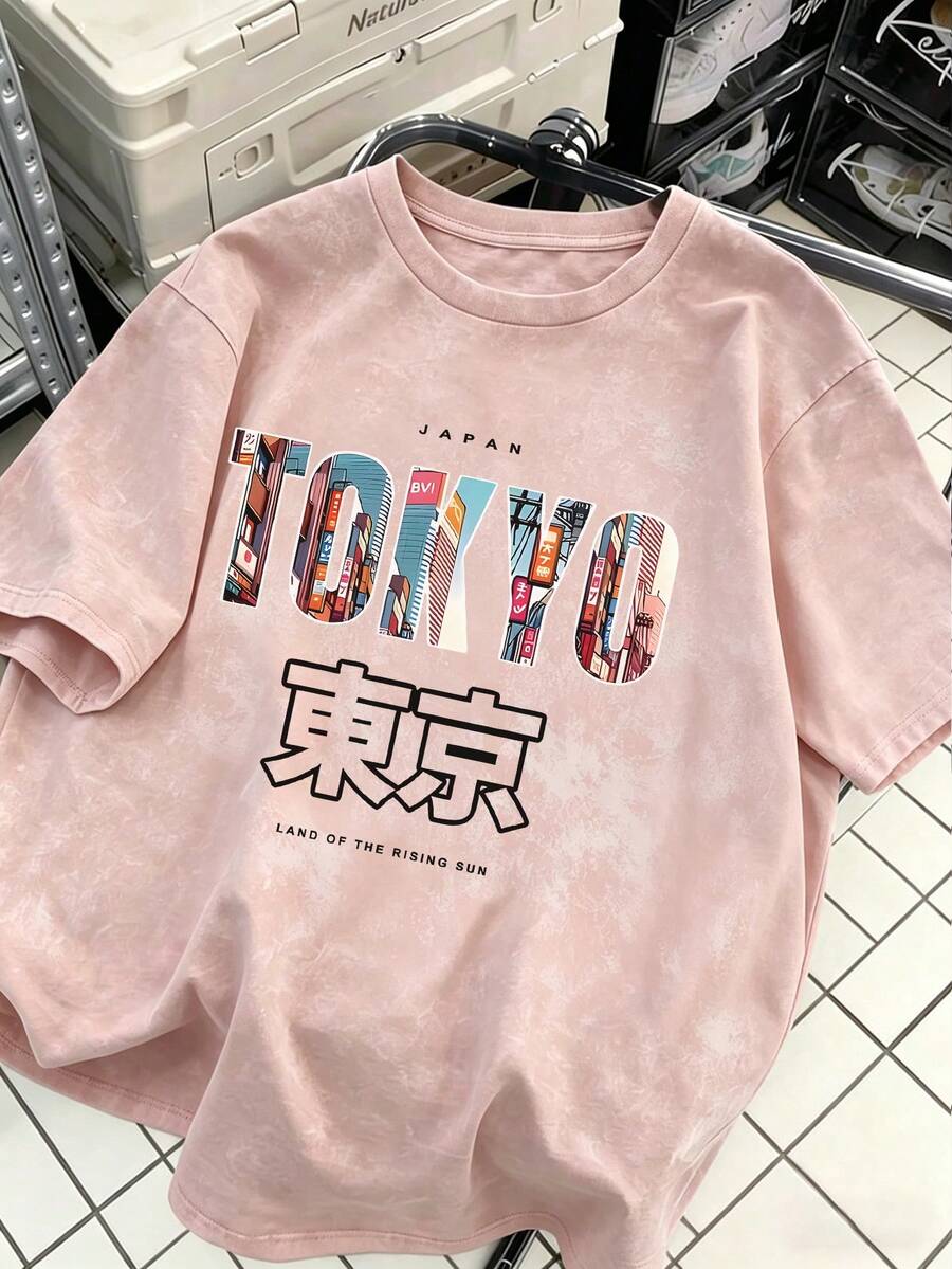 Nouveau t-shirt d'été simple pour femmes, motif lettres Tokyo, en tissu lavé. Col rond, manches courtes, ample et polyvalent. Décontracté pour les vacances. Couleur rose