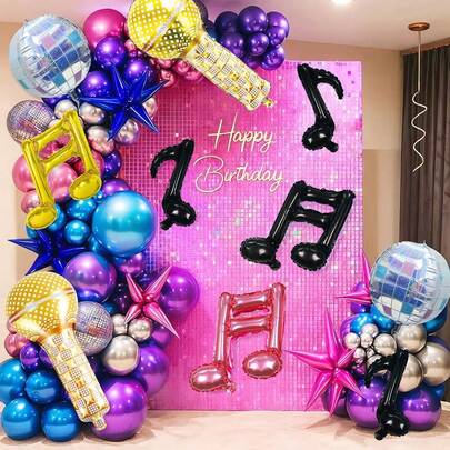 Bộ 10 món trang trí tiệc chủ đề âm nhạc với hình nốt nhạc, bao gồm quả cầu disco, micro, nốt nhạc và bóng bay hình nốt nhạc. Thích hợp cho trang trí tiệc sinh nhật chủ đề nhạc K-Pop, quay video ngắn, tiệc karaoke, tiệc sinh nhật chủ đề disco thập niên 80, dạ hội đêm sao, trang trí tiệc đón năm mới.