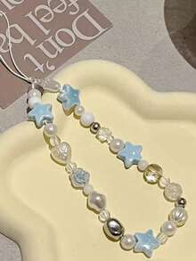 1 chiếc dây chuyền hình ngôi sao đính hạt pha lê xanh mộng mơ thời trang, thích hợp để treo điện thoại, máy ảnh, tai nghe, phụ kiện trang trí cá nhân hóa. - Màu xanh cộng với trong suốt - Xem 12
