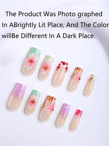 24 pièces de faux ongles longs et carrés dans un coffret cadeau. Fleurs roses nues peintes à la main avec un vent doux sur le côté français. Fleurs roses tridimensionnelles peintes à la main avec des perles en acier doré et des perles de bulles transparentes dégradées de lavande. Détachables pour les sorties quotidiennes, les rendez-vous, les vacances des filles. Comprend 1 pièce de gelée de protection. - Multicolore - Voir 4