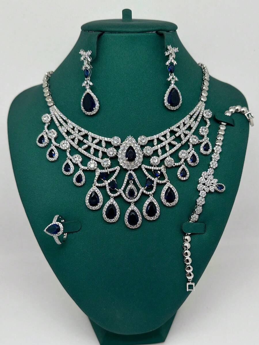 Juego de joyería de 4 piezas con colgante con borla de circonita cúbica con forma de corazón, aretes, pulsera y anillo. Accesorio elegante para fiesta, boda y novia - azul real - Ver 1