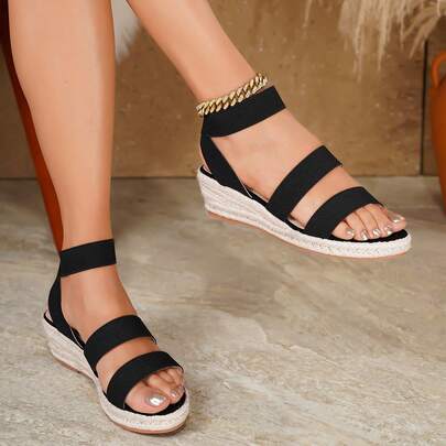 Giày sandal đế xuồng dệt kim thời trang nữ, thích hợp cho kỳ nghỉ.