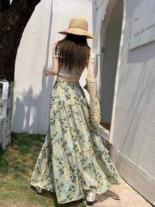 Chân váy xếp ly dáng rộng cạp cao in hoa phong cách Bohemian mùa hè 2026 mới, kiểu dáng nhẹ nhàng đồng quê cho kỳ nghỉ. - màu xanh lá - Xem 4