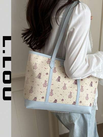 2026新款可爱卡通印花大容量单肩手提包，适合学生和通勤族。