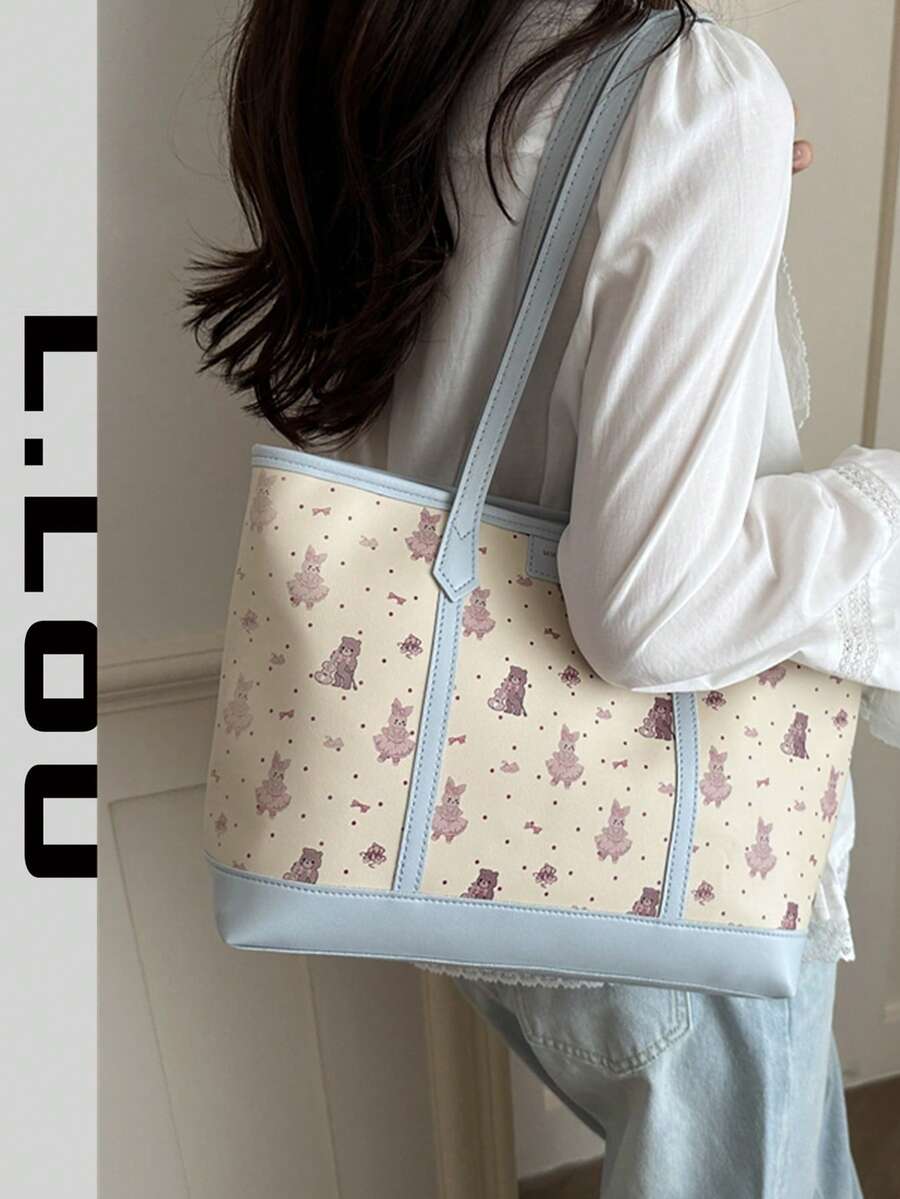 2026新款可爱卡通印花大容量单肩手提包，适合学生和通勤族。