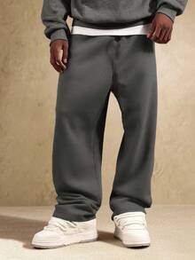 Pantalones jogger casuales de hombre de unicolor, ligeros y transpirables de punto de poliéster, pantalones esenciales de estilo novio para ejercicio al aire libre y baloncesto, primavera - Gris Oscuro - Ver 3
