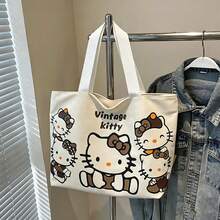 SANRIO 1 chiếc túi tote vải canvas cỡ lớn in hình Hello Kitty hoạt hình màu nâu và đen kiểu retro, chất liệu vải canvas cotton bền chắc, thiết kế đeo vai và xách tay, miệng túi mở, kiểu dáng Nhật Bản dễ thương, thích hợp làm ba lô học sinh, túi đi làm. - Nhiều màu - Xem 4
