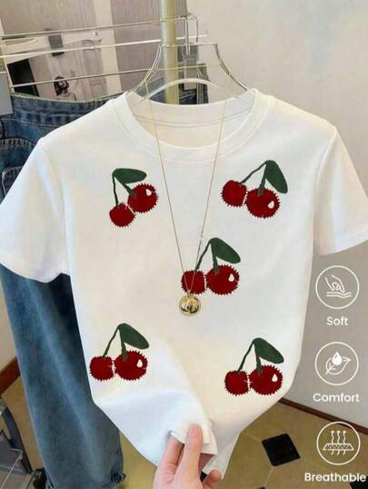 Camiseta de manga corta con cuello redondo y estampado de cerezas para preadolescentes. Ideal para chicas mayores, perfecta para el verano, estudiantes y niñas. Cómoda, informal y de corte holgado para el día a día.
