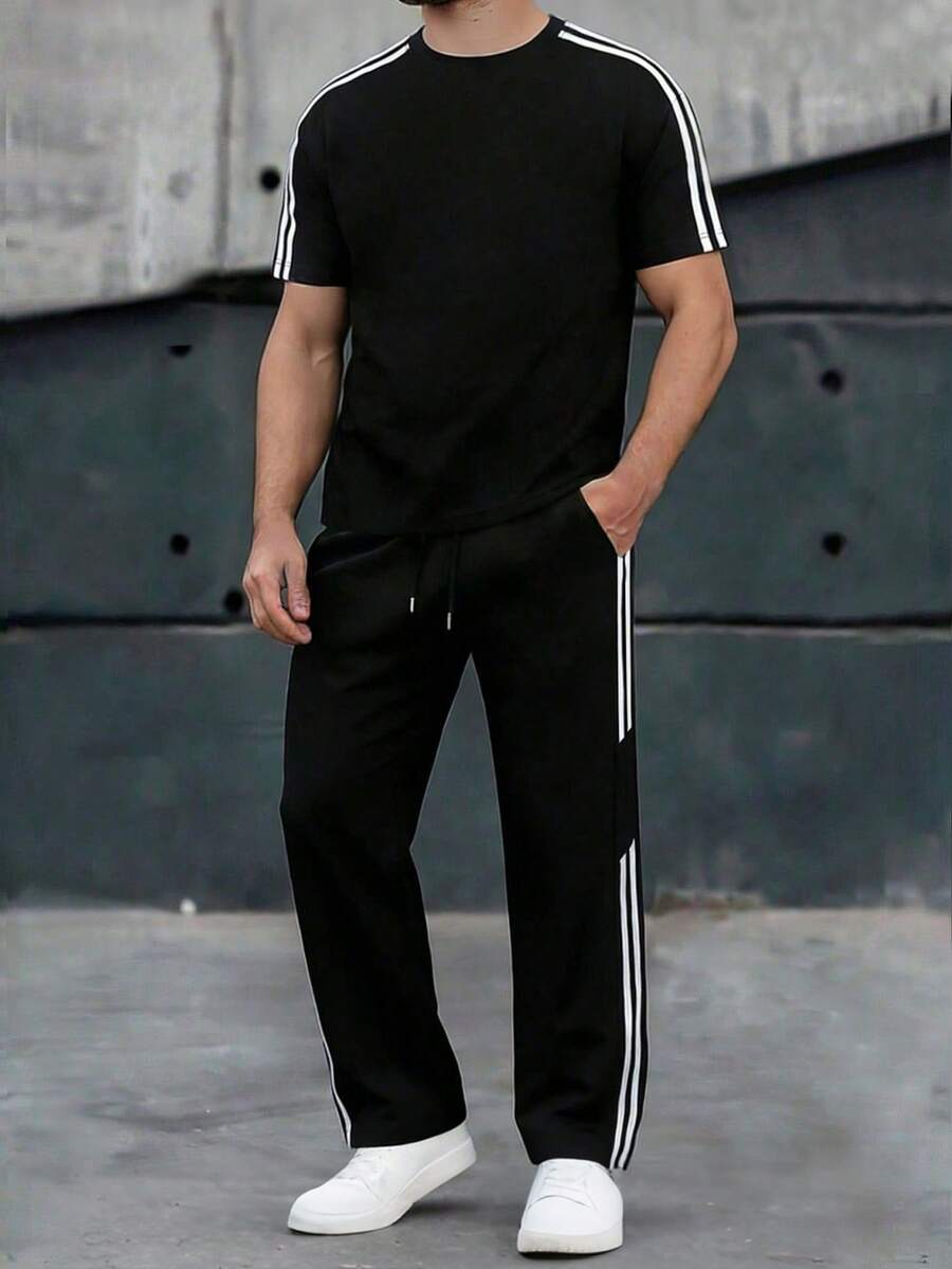 一套男士宽松简约夏季休闲套装，包括条纹上衣和直筒裤，适合通勤、街头穿搭、户外运动、健身训练和跑步等多种场合。 - 黑色 - 查看 1