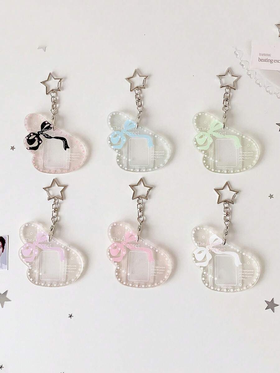 1 chiếc ốp lưng cứng hình cánh nhỏ 1 inch dùng để trưng bày ảnh ID, móc khóa hình ngôi sao, quạt, bảo vệ thẻ.
