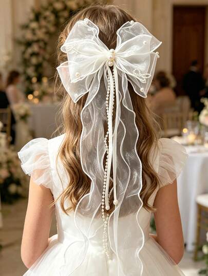 1个珍珠流苏蝴蝶结发夹，多功能婚礼发饰，适合婚礼、派对和拍照场合。