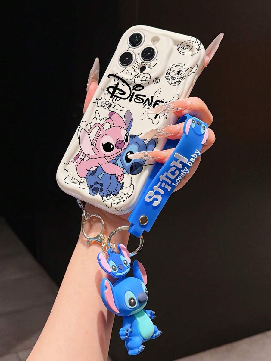 Disney Lilo & Stitch Phone Case With Stitch Wrist Strap & 3D Plush Keychain, Cute Stitch & Angel Hugging Cartoon Print With Black Doodle Background, Shockproof Silicone Wave Edge Case With Hand Strap, Disney Stitch Phone Cover For IPhone 17, 16, 15, 14, 13, 12, And 11 Pro Models. Made Of Durable TPU With Shockproof Protection. A Fun Gift For Family, Friends, Birthdays, Holidays, And Special Occasions. - trắng - Xem 1