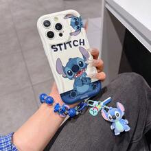 Disney Lilo & Stitch Phone Case With Stitch Beaded Wrist Strap & Plush Keychain, Cute Stitch Cartoon Full Print With "STITCH" Text, Shockproof Silicone Wave Edge Case With 3D Stitch Charm & Hand Strap, Disney Stitch Phone Cover For IPhone 17, 16, 15, 14, 13, 12, And 11 Pro Models. Made Of Durable TPU With Shockproof Protection. A Fun Gift For Family, Friends, Birthdays, Holidays, And Special Occasions. - trắng - Xem 2