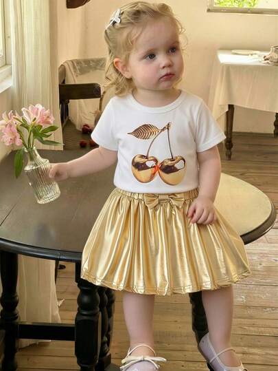 Girls' Shiny Cherry Print Short Sleeve T-Shirt + Bowknot Decor Gold Skirt 2-Piece Set, Sweet & Fashionable Casual Outfit For Spring/Summer