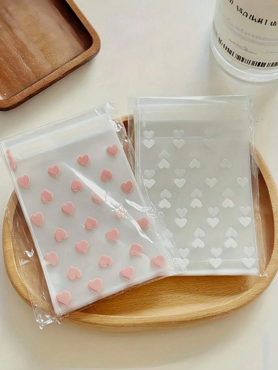 1/25/50/100个装创意透明心形自粘包装袋，适用于饼干、糖果和甜点，是礼品和庆典包装的理想之选，非常适合情人节、婚礼和其他节日。