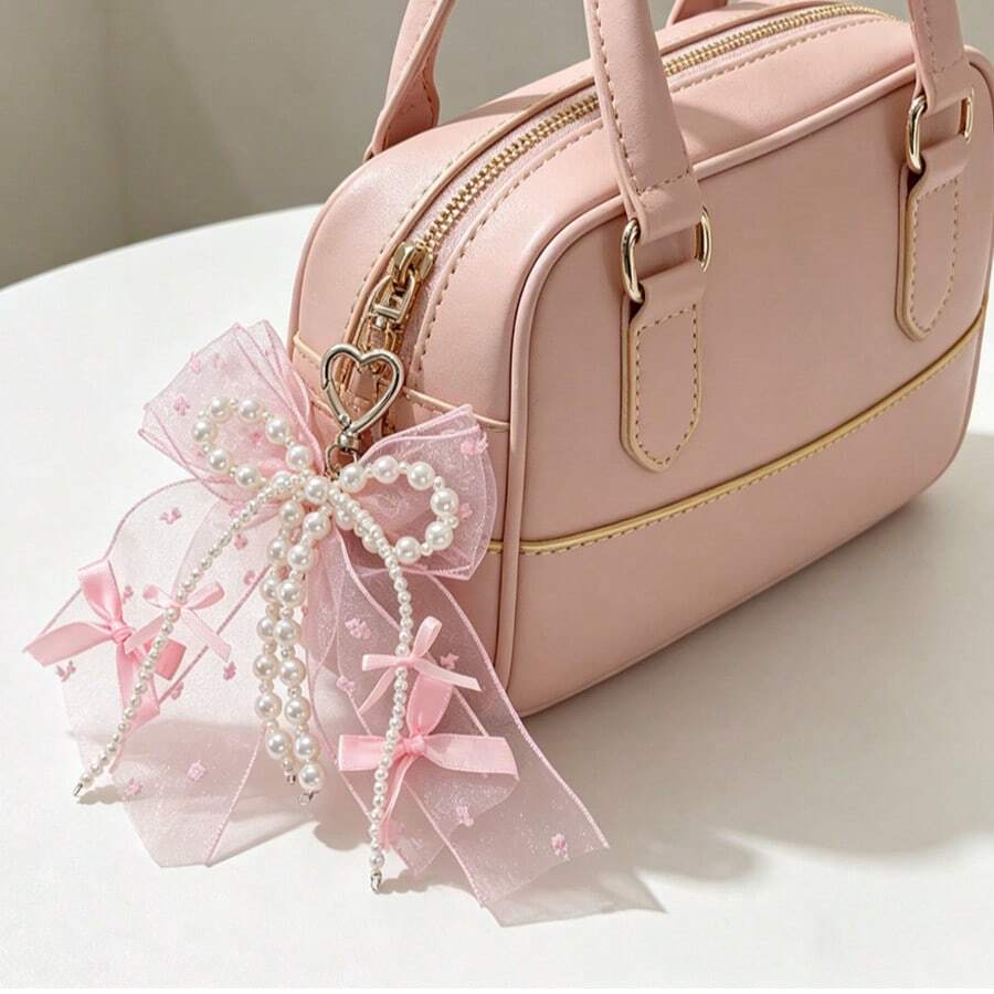 蕾丝层叠蝴蝶结珍珠钥匙扣，可爱蝴蝶结设计，包包装饰挂件，时尚高品质包包钥匙扣，甜美可爱精致少女仿珍珠蕾丝蝴蝶结DIY钥匙扣，蕾丝蝴蝶结包包挂件，蝴蝶结包包配饰，蕾丝包包挂件，心形包包挂件，女士包包挂件，丝带包包挂件，仿珍珠包包挂件，珍珠蝴蝶结包包配饰 - 彩色 - 查看 1