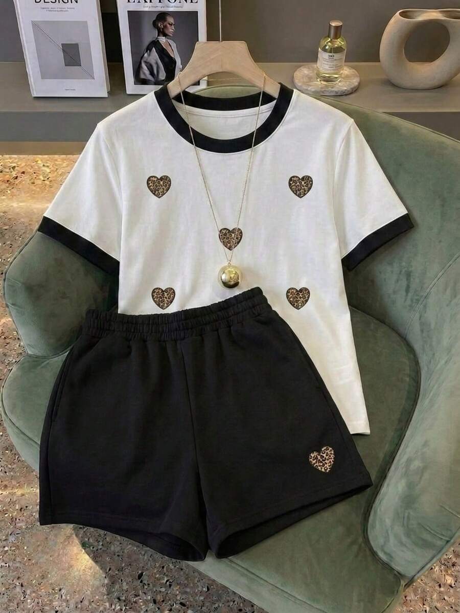 Conjunto mujer camiseta y short, camiseta de manga corta con ribete en contraste y shorts estampado corazón de animal print. - BLANCO RN - Ver 1