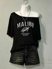 Áo thun nữ màu đen hở vai tay ngắn, chất liệu polyester, in hình rùa biển Malibu thời trang, vải co giãn, phù hợp mặc hàng ngày. - màu đen - Xem 10