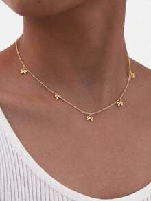 1 chiếc vòng cổ choker mạ vàng với mặt dây chuyền hình nơ nhỏ xinh, kiểu dáng Y2K dễ thương, ngọt ngào và cá tính dành cho nữ, thích hợp đeo hàng ngày, đi làm, dự tiệc Valentine hoặc sinh nhật. - 5 chiếc vòng cổ hình nơ - Xem 2