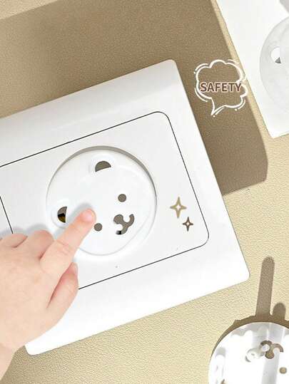 10 piezas Cubiertas de enchufe de toma de corriente con forma de oso lindo, protectores de eléctricos para bebés, producto de para bebés de alta conversión y caliente