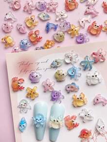 50pcs/100pcs Ocean Style Shiny Star, Seashell, Crab, Seahorse, Shell, Octopus Pattern Nail Art Decorations, DIY Colorful Ocean Element Nail Jewelry, Nail Products, Mixed Shapes And Styles - Multicolor - View 1