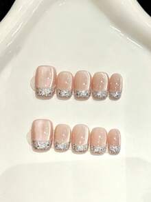 10 piezas de uñas postizas cortas en forma de ataúd hechas a mano para fiestas y uso diario, uñas de color rosa, uñas postizas cortas hechas a mano con efecto de diamante roto en tono francés, uñas minimalistas de ojo de gato brillante y deslumbrante, fáciles de usar. 10 piezas de uñas postizas hechas a mano estilo Y2K, brillantes y deslumbrantes, adecuadas para festivales, fiestas y uso diario de chicas y mujeres, apropiadas para primavera y verano - Rosa Pálido - Ver 10
