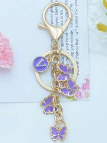 1个蝴蝶字母钥匙扣，紫色包包挂饰，珐琅吊坠钥匙圈，简约女士礼物 - 淡紫色 - 查看 12