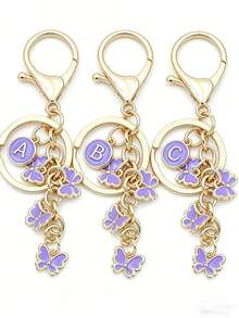 1个蝴蝶字母钥匙扣，紫色包包挂饰，珐琅吊坠钥匙圈，简约女士礼物 - 淡紫色 - 查看 2